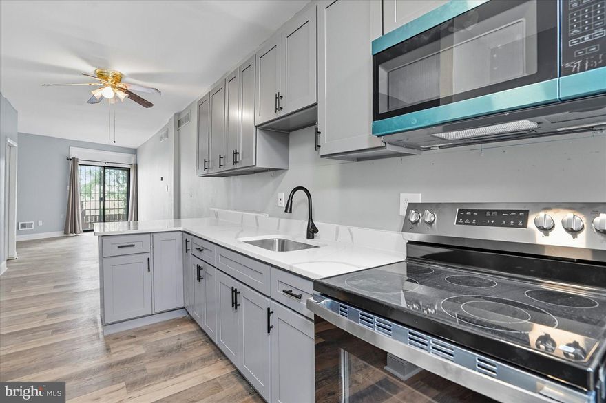 MAJOR PRICE REDUCTION!! Charming & Updated 3-Story Townhouse in Baltimore! This recently refreshed townhouse comes with modern updates, offering 3 spacious bedrooms and one full bathroom across an airy and open concept design. The heart of the home is the very sleek, updated kitchen, featuring brand-new appliances, quartz countertops, and new cabinets, where you'll have ample amounts of storage! Original charm shines through with beautifully preserved wood staircases and gorgeous engineered Hardwood Floors. The second level provides 2 bedrooms and 1 beautifully designed bathroom!
On the third level, enjoy cozy evenings by the wood burning fireplace, creating a warm and inviting atmosphere in the winter. And enjoy a cooled third floor in the summer with a separate Ductless Mini Split system.  The unfinished, but CLEAN, basement provides generous storage space and potential for future customization with plenty of ceiling height for a Baltimore townhome!! Ideal for homeowners or investors, this home offers both style and opportunity in a convenient Baltimore location, within minutes to downtown and any shopping! Come tour your new home today!