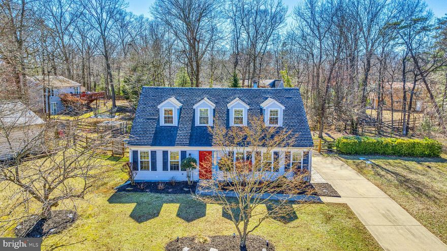 This home sits on a large lot, providing ample space for outdoor activities and potential garden projects. Backyard is fenced with so much room for everyone. (playset are as is with lots of life in them) Step inside and you’ll discover an updated kitchen that any home cook would envy, outfitted with stainless steel appliances and granite counters that lend a sleek finish to the room. 
Bathrooms have been updated to feature modern fixtures and finishes, making your daily routines feel like a visit to a spa. New carpet on the upper level, LVP grace the main level with ceramic in the kitchen and breakfast nook. If the weather is cold the large fireplace makes inside warm and cozy. Looking for a relaxing time outdoors the large patio brings so much possibilities to include a basketball hoop that conveys.  With fresh paint, new appliances and a spanking new HVAC unit this home is everything you are looking for and more.
The community is equally impressive, offering access to a Community Center where you can meet neighbors and participate in events. With its prime location in Waldorf, this home balances community charm with urban convenience, making it a perfect choice for prospective homeowners from all walks of life.