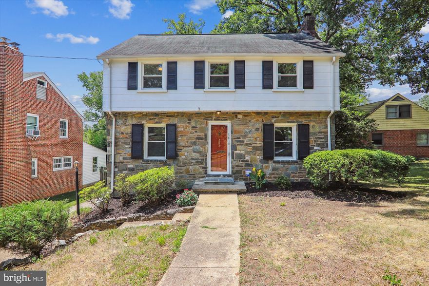 This beautiful, stone front 3-bedroom, 2 1/2 bath home offers a perfect blend of modern updates and classic charm. Step inside to find hardwood flooring in the living and dining rooms, creating a warm and inviting atmosphere. The living room has a wood-burning fireplace and French doors to the deck. The kitchen has been updated with new luxury vinyl plank flooring, granite counters, new appliances (2023) and features a bright and spacious layout, complete with a dining nook that could also serve as a home office. A powder room and a second door to the deck add to the convenience.

 Upstairs, you will find 3 spacious bedrooms with hardwood floors and overhead lighting. The primary bedroom has 2 closets- one provides access to attic storage. A charming hall bath completes this level.

Outside, a large deck overlooks the shady backyard, providing the perfect spot for relaxing and enjoying the peaceful surroundings. The extra-large driveway offers plenty of off-street parking for multiple vehicles, making hosting guests a breeze.

The lower level of the home boasts additional living space with a large picture window, a full bath and kitchenette. It can be used for a variety of purposes such as a recreation room, guest room, or office. With plenty of closet and storage space, you'll have no shortage of room to stay organized. The lower level has 2 entrances and a covered sitting area for additional private space.

This home also features a new hot water heater, updated flooring, replacement windows, newer (2023) appliances and a layout that allows for plenty of flexibility with how you use the space.  Total finished square feet is 1753 sq ft estimated. The house has dual-zoned HVAC.

Located less than 1.4 miles from 2 Metro stations, and about 1 mile from the Hyattsville Arts District.

Don't miss out on the opportunity to make this fantastic property your new home!
