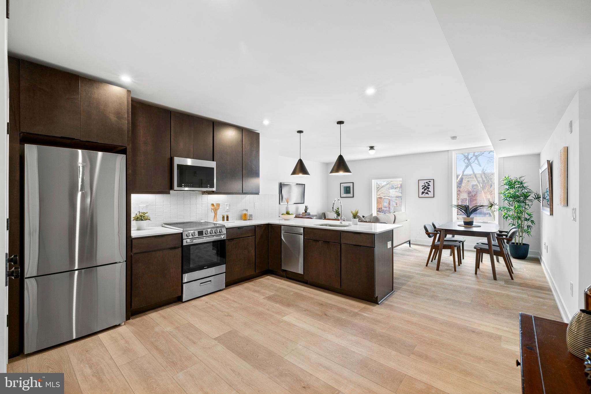 Welcome to Wilton Place, new luxury apartment living located in Southwest Philadelphia. This four-story building is composed of 45 tastefully developed residential units - with 2 elevators that service all floors and rooftop deck - Wilton Place amenities offer a fitness center, sauna, keyless entry, in-unit laundry, 24-hour camera surveillance, bike storage, package room, and more. Residents share access to a roof deck that will offer ancillary space for entertainment and relaxation, complete with scenic skyline views. 5200 Chester is pet-friendly and designed to have a clean and minimal look while incorporating unique architectural details to enhance the quality of living. Featuring primarily 1 and 2 BD units, each comes equipped with top-of-the-line, warm selections. Select your preferred floor plan and optimal, open living standard. Kitchens feature quartz countertops, gleaming stainless steel appliances, mocha cabinetry, tile backsplashes, decorative pendant lighting, and garbage disposals. Each bathroom is spacious and offers crisp flooring tile, storage vanities, chrome fixtures, and stylish mirrors. Wide plank oak flooring throughout. Select two bedroom units have an additional full bathroom. The building amenities are bar none offering a state-of-the-art fitness center and sauna, 24-hour surveillance, common roof deck, and keyless entry. There is ample bike storage. Landscaping by local Apiary Design. This location is in close proximity to public transportation (namely, the trolley - right outside) which makes for a quick commute into University City, Center City, and other areas of Philadelphia. Don't miss this chance to live in a brand new, one-of-a-kind building in a neighborhood that offers all the best of Philadelphia! 1 BD units start at $1350/mo. 2 BD units start at $1550/mo. Units available NOW. Generally, first, last, and security are due upon move-in. $40 application fee per applicant. $45 flat water fee/mo. First, last, and security due at signing. Photos may be of a similar staged unit.