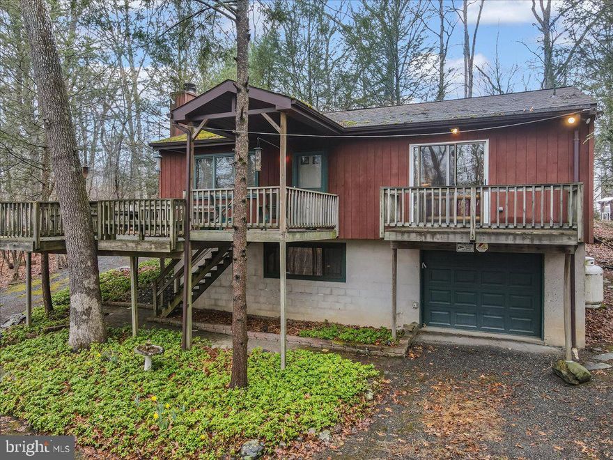 CHECK OUT MY NEW PRICE.. Discover your perfect retreat in this charming raised ranch home nestled on a private wooded lot. This home comes fully furnished, with three-bedrooms, two-bath and offers the ideal blend of comfort and tranquility you've been searching for.
Step inside to find a warm and inviting living space anchored by a stunning large brick fireplace - perfect for cozy evenings and gathering with loved ones. The main level flows seamlessly, creating an open feel that's both practical and welcoming.
The real magic happens when you explore the finished lower level, complete with a spacious rec room that's ready for movie nights, game days, or whatever fun you have in mind. Whether you need a home office, playroom, or entertainment space, this area adapts to your lifestyle.
Outside, you'll love the screened-in porch where you can enjoy morning coffee while listening to birds chirp in your private wooded backyard. The additional deck extends your living space outdoors, making it easy to host barbecues or simply unwind after a long day.
Privacy seekers will appreciate the natural buffer the mature trees provide, creating your own peaceful sanctuary. Plus, with low homeowner association dues, you can enjoy all these benefits without breaking the bank. This home truly offers the best of both worlds - a serene woodland setting with modern conveniences and thoughtful features throughout. Look at the last Photo of all that is in the garage... snowblower, Kayak and so much more. ALL IN THE LISTING PRICE...