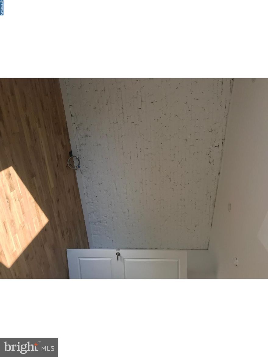 This is for recording purposes. This was a 2-story full gut rehabbed home with 3 bedrooms, 2.5 bathrooms, tax abatement, new brick front, new cement patio, and finished basement.