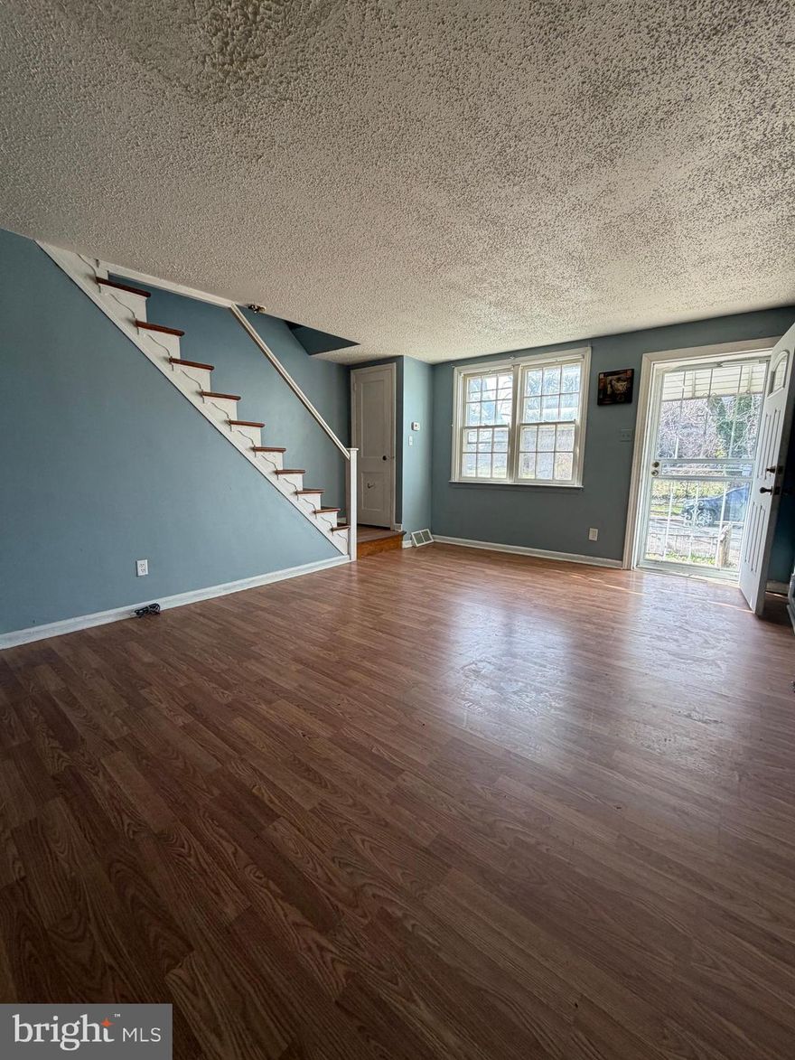 Lots of potential with this bright row home located right off of 352, to Brookhaven,  Subaru Park  & the Philly airport.  Whether you're looking for your next home or investment property this property is a great fit for either buyer. Chester Housing Authority has a real need for affordable housing and is offering over $1800 per month for 3BR homes  After some very minor improvements this home is ready for a new homeowner or a new tenant. The main floor has a bright bay window in the living room and luxury vinyl flooring.  The dining area off off the kitchen has a sliding glass door that leads out to the deck. The upper level is equally bright and spacious with 3 nice sized bedrooms  & a hall closet.  The bathroom is all tile with a charming skylight.  The full basement is dry and finishable with a walk-out to the off street parking below the rear deck. The front has a fenced in yard and a quaint patio area.