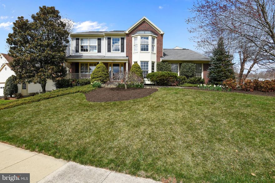 Popular Dartmouth Model w/front porch,side load garage,newer expanded driveway,hardwood floors,bay windows,plantation Shutters` Sunny Two Story Foyer * Bay Windows *  Open & Inviting Combination of Kitchen, Breakfast/ Family Room w/skylights,built in bookcases,new gas cook top,beautifully landscaped, gas fireplace logs,renovated kitchen w/granite