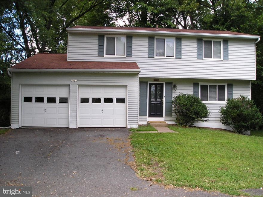 Beautifully located 5 bedroom, 2.5 Bath colonial with 2-car garage in great community, backing to mature woods on a cul de sac.  Offers hardwood floors on main level, family room off the kitchen w/wood burning fp, updated baths, new stainless kitchen appliances and much more! Excellent school district. Blocks to elementary school, playgrounds, grocery shopping, restaurant, & 2 community pools.