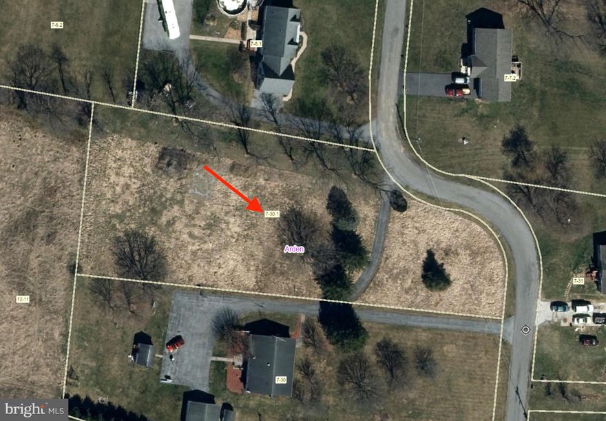 UNRESTRICTED lot with 3BR SEPTIC SYSTEM ALREADY INSTALLED.  Level 1.13ac building lot. Public water hook-up availability letter in hand.  Existing asphalt driveway. Lot is cleared  with a few mature shade trees remaining. Corners are marked. Septic is marked. Clean-outs are marked.  Build a single family home OR pull your single wide or doublewide onto this lot.