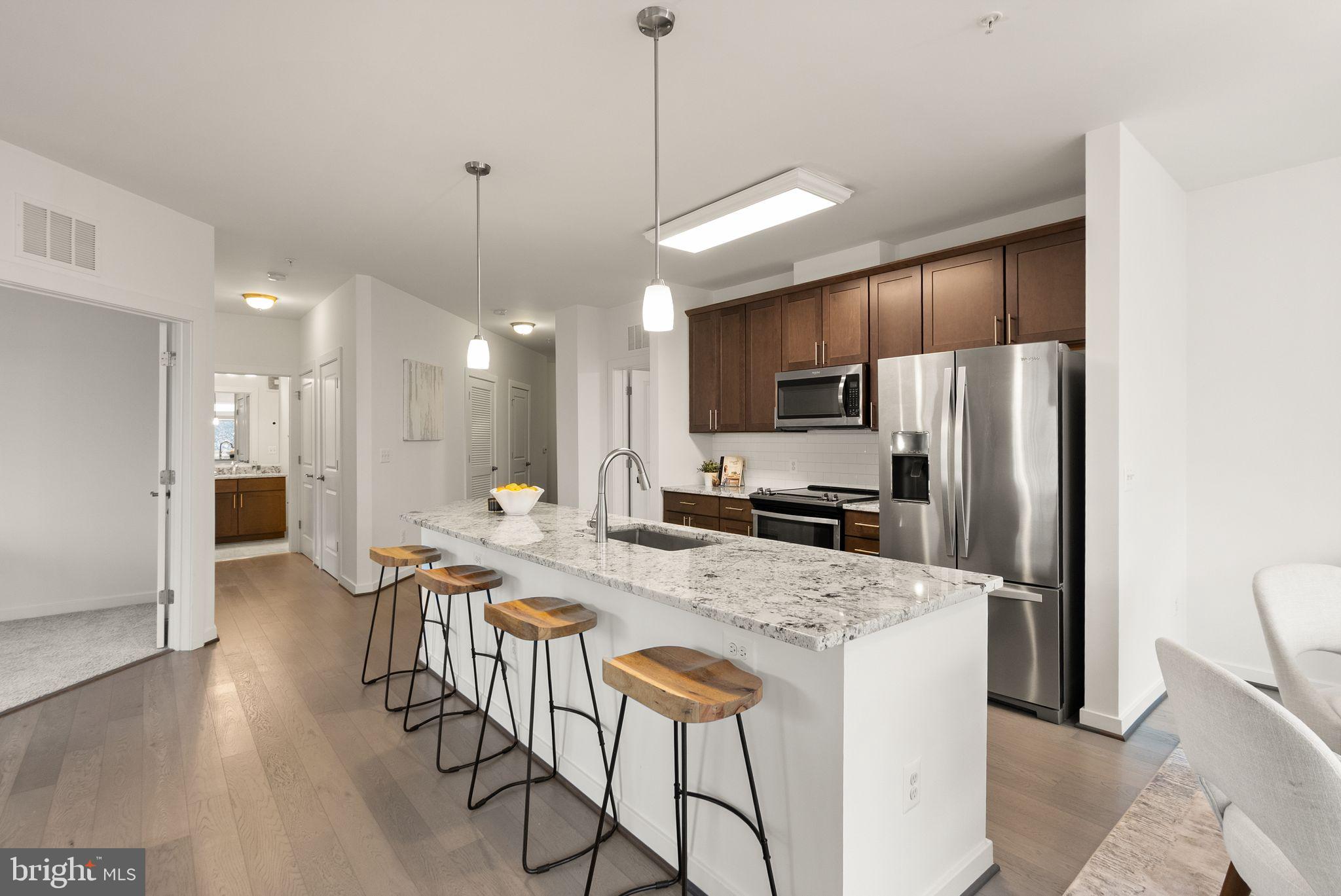 9450 SILVER KING COURT 203