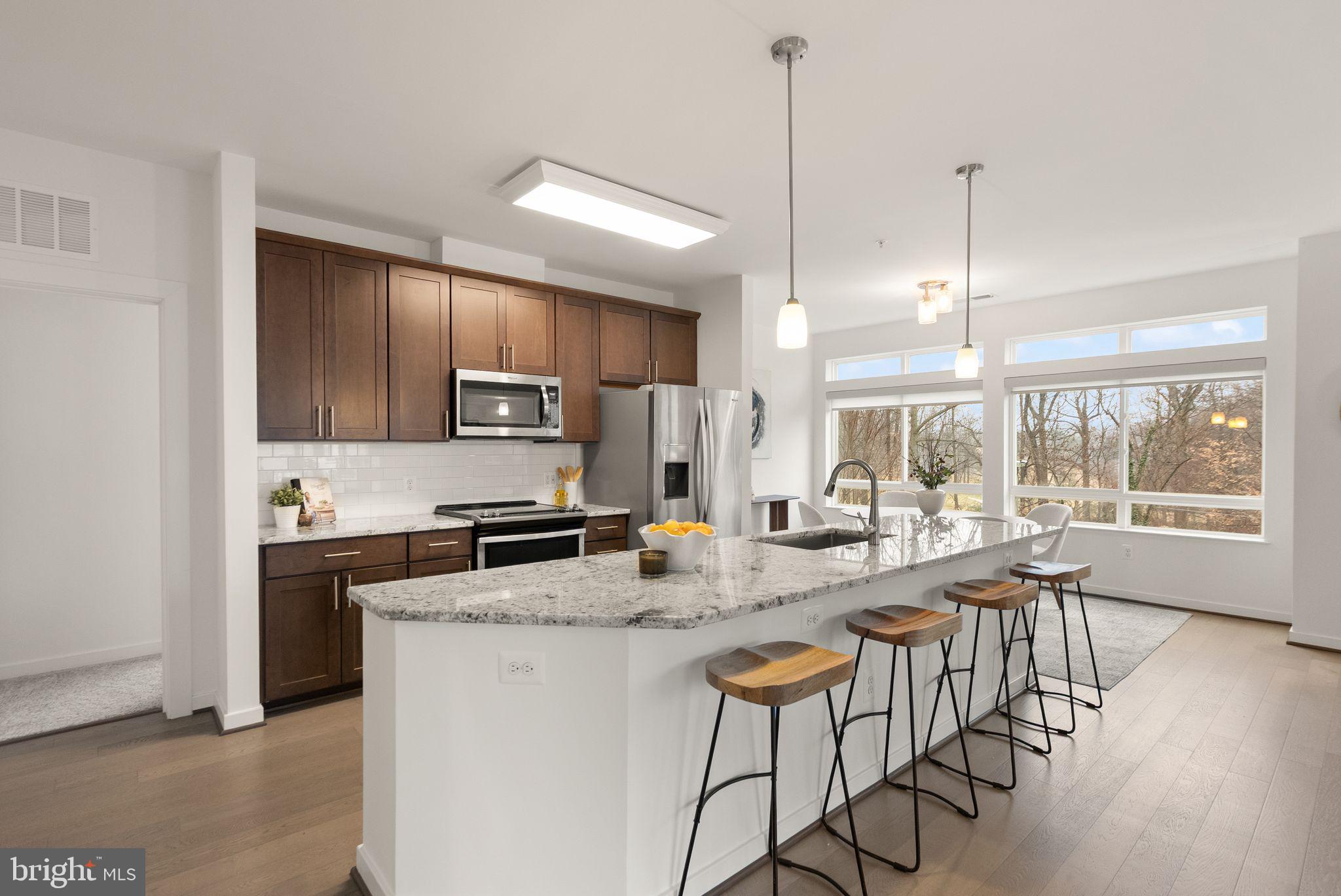 9450 SILVER KING COURT 203