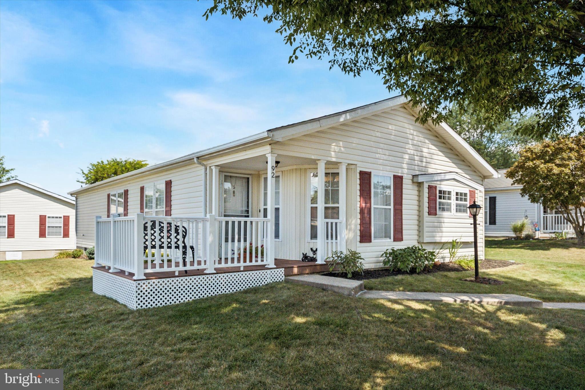 Welcome to Buckingham Springs – Your Next Chapter Starts Here!
Discover comfort, convenience, and community in this spacious 2-bedroom, 2-bath home located in the sought-after 55+ Village of Buckingham Springs in New Hope, PA. Step onto the charming covered front porch, with extended deck, and into a generously sized living room, perfect for relaxing or entertaining. The eat-in kitchen offers ample space for casual meals, while a dedicated dining area adds flexibility for hosting. Both bedrooms are impressively roomy, with abundant closet space—including a walk-in closet in the primary suite. Two full bathrooms ensure privacy and ease, and a backyard shed provides extra storage for seasonal items or hobbies. Enjoy access to vibrant amenities like a heated pool, clubhouse, and social events—all nestled in a peaceful, well-maintained community. With quick settlement available, this move-in-ready home won’t last long. Schedule your showing today and experience the lifestyle you’ve been waiting for.