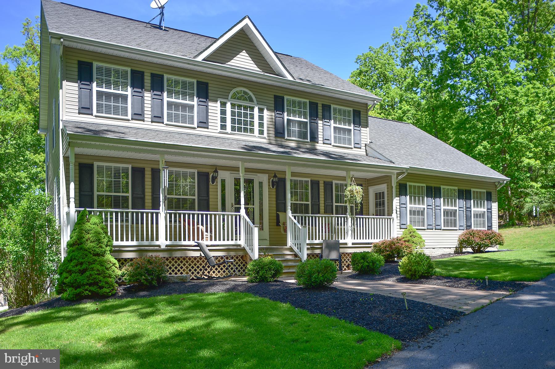 Absolutely beautiful custom-built colonial nestled on 4 private, wooded acres! This one-owner home offers 3 bedrooms, 2 full bathrooms, and 2 half baths, combining space, comfort, and timeless design. Step into the elegant two-story foyer and continue into a spacious kitchen that flows seamlessly into the cozy family room with a fireplace and access to the rear deck, perfect for entertaining or relaxing. The main level also features a formal dining room, living room, home office, half bath, and a convenient laundry room. Upstairs, you'll find a generous primary suite with a full bath, along with two additional bedrooms and another full bath. The finished basement adds even more living space, complete with a bar, pool table area, second family room, half bath, and a level walkout to a patio and the serene backyard. A storage room and utility room complete the basement. This home also includes an attached 2-car garage and ample driveway parking. Conveniently located with easy access to Alt. Route 40, I-70, I-81, and easy access to Frederick and Washington, D.C. Close to schools, grocery stores, and more! Boonsboro elementary, middle and high! Minutes to beautiful Greenbrier State Park! Don’t miss the opportunity to own this stunning retreat, schedule your showing today!