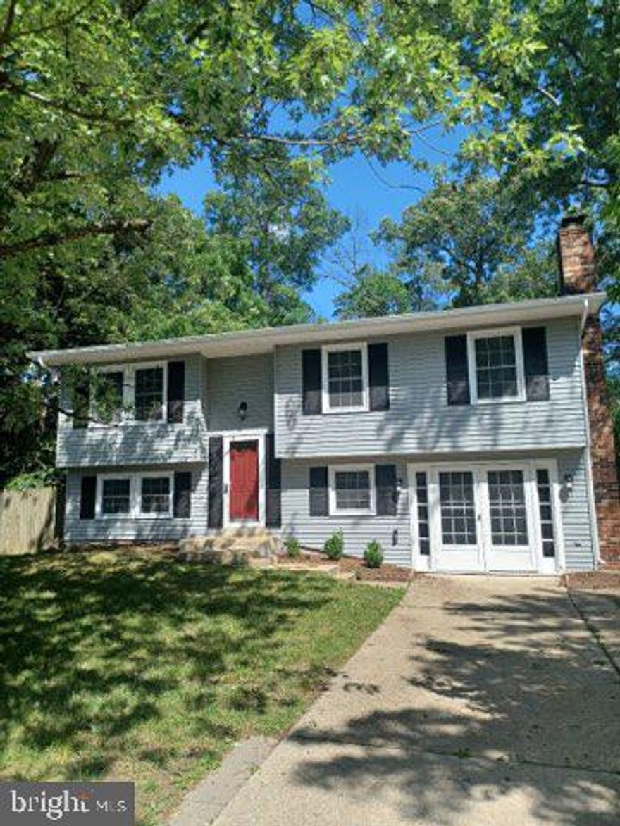 Detached - 4 bedroom, 2 full bath Split Foyer with large flat rear yard and driveway.  All you need to do is move in.  White cabinets,  Stainless Steel appliances, Luxury vinyl flooring and plush carpet in the basement with bar and 2 fireplaces.  Call helpful agent to schedule your showing today.