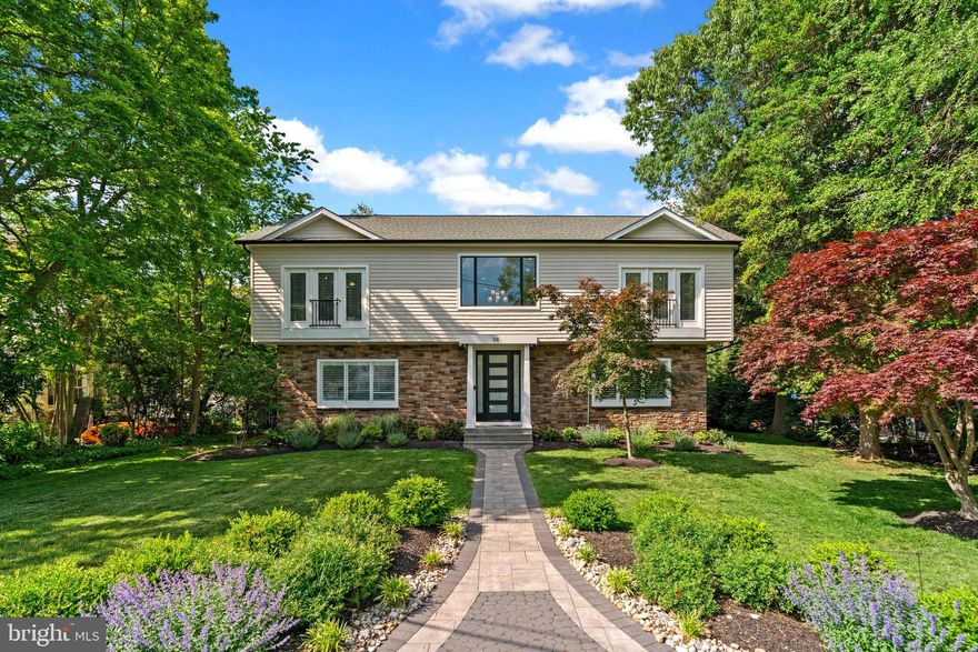 Nestled in Severna Park's highly desirable water privileged community of Linstead on the Severn, this exquisitely renovated home offers sophisticated living with year round views of the Severn River. Situated on a generous, flat 1/3+ acre lot, the property boasts a beautiful in-ground swimming pool and a fabulous outdoor entertaining space perfect for enjoying the summer months. Renovated from top to bottom in 2021, this impressive residence features over 5,000 finished square feet, including five bedrooms, four full and two half bathrooms, and a convenient rear-entry two-car garage. The stunning open-concept main level is highlighted by a striking dual-sided fireplace and flows seamlessly into the chef-inspired gourmet kitchen with a large center island, walk-in pantry, beautiful stainless steel appliances, and ample cabinet and counter space. The spacious great room features high ceilings and an abundance of natural light, while a dedicated main-level home office provides a private workspace. A convenient main level bedroom suite is perfect for guests, in-laws or the aupair. A thoughtfully designed, dreamy mudroom with built-in cabinetry adds practicality and convenience with access to the pool and garage.  Upstairs, a versatile loft area overlooks the grand two-story foyer, and you'll find four private bedroom suites, 2 with en-suite bathrooms plus a beautiful hall bathroom. The grand primary suite offers a spacious bedroom and a spa-like bathroom with a soaking tub and integrated shower. All bedrooms feature spacious closets and a neutral color palette. The finished lower level, with walk-up stairs to the rear yard, includes a home gym, a recreation area with a wet bar, a half bathroom, and ample storage. Residents of Linstead enjoy unparalleled access to a private community beach on the Severn River and a vibrant, active community with events for everyone. Easy commuter access to major routes. Walk to downtown Severna Park and the B&A Trail. Close to restaurants, shopping & entertainment. Schedule your private tour today.