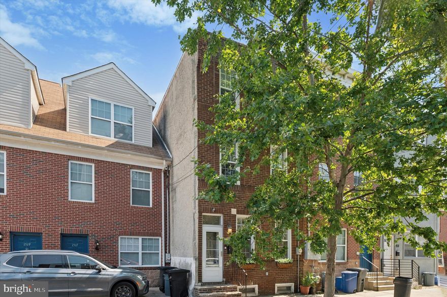 Welcome to 1515 Ellsworth Street, a beautifully maintained and spacious 3-bedroom, 2.5-bath home ideally located in the heart of Point Breeze. Offering over 1,830 square feet of living space plus a finished basement, this property is a true gem with incredible value at its new price.
The main level features an open and airy layout with hardwood floors, recessed lighting, and high ceilings. The large living and dining areas include a coat closet and convenient half bath. A thoughtfully updated kitchen boasts granite countertops, stainless steel appliances, and abundant natural light from side windows and sliding glass doors that lead to a stunning backyard—set on a rare 94-foot-deep lot, perfect for entertaining and outdoor living.
The finished basement offers comfortable ceiling height, additional storage, and a laundry area. On the second floor, you'll find two generously sized bedrooms with ample closet space and a full hall bath with tile and a soaking tub. The third-floor primary suite includes a walk-in closet, spacious bath with soaking tub and separate shower, and access to a  roof deck with panoramic skyline views.
This home is perfectly situated just two blocks from Sprouts Market, Target, Lincoln Square, and steps from public transportation with easy access to Center City and major highways. Don’t miss this exceptional opportunity to own a standout property in one of Philadelphia’s most vibrant neighborhoods.