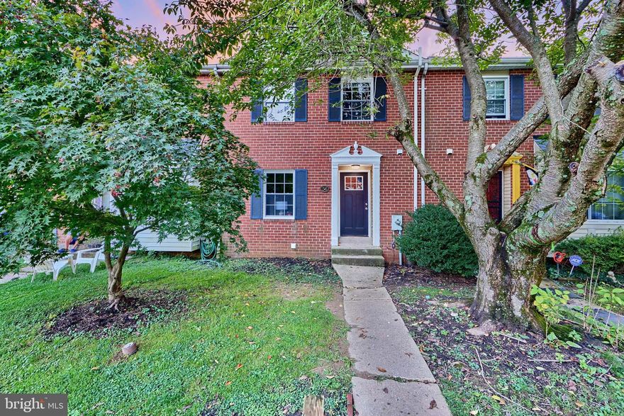 Recently updated three-bedroom, two-and-a-half-bath townhouse with an open layout with neutral colors. White kitchen cabinets with stainless appliances, quartz countertop, and ceramic backsplash. The second level has three nice-sized bedrooms with one full bathroom. The main level features gleaming hardwood floors and a beautiful wood-burning fireplace. A large walk-out basement with fresh paint, new carpet, and a full bathroom.