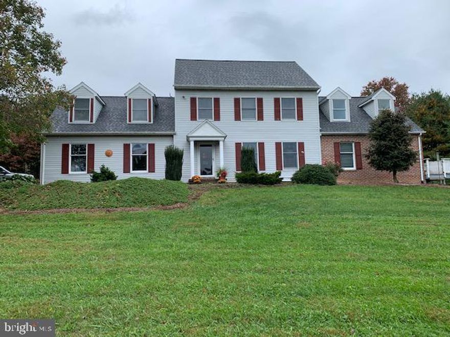 Looking for peace and quiet, space  to  have animals or grow stuff? This is it.  9 acres mostly open on gentle south facing slope. Formerly an ornamental landscape plant nursery with a number of useable plants still growing.  Rural location, 1000' long driveway for privacy, elevated homesite for valley views. Over 3000 sq.ft. of living space, 2 zone heat pumps with propane back-up, 2 garage spaces on main level plus 2, under the house spaces on basement level. 5 bedrooms  and  3 full baths on upper level, half bath on main level. Primary bed and bath addition is  brand new, just completed.  22 X 14  finished rec-room in lower level offers a getaway spot. No HOA, no restrictions, zoned AG.