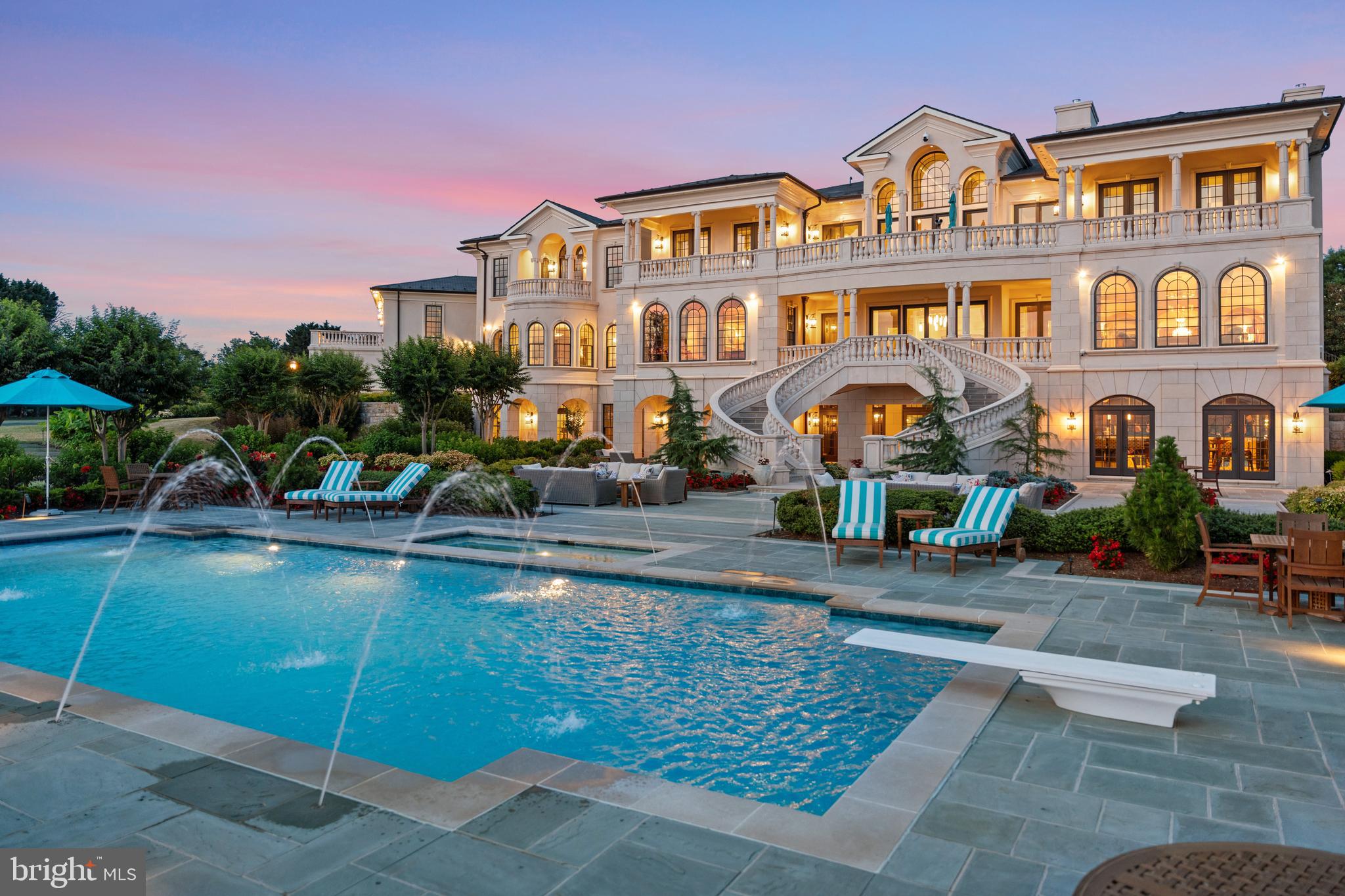 BRIDGEVIEW; a prestigious legacy property in a league of its own! Prominently displayed on the banks of the Bay, and aptly named to reflect the unobstructed views of the Chesapeake Bay bridge, this 18 acre estate is a true masterpiece inside and out. The attention to detail, commercial grade construction, interior design, craftsmanship and quality of materials are unparalleled. The grounds feature spectacular 180 degree Bay views, heated pool/spa with fountains, outdoor kitchen and pavilion, professional landscaping, sandy beach and private pier with boat and jet ski lifts, creating a peaceful haven filled with sculpted gardens, open expanses and the tranquil sounds of water fowl and wildlife. Upon entering the gate the lush lawn and landscaping relaxes you and guides you to the stately architecture of the home. The grand entry sets the tone for the home featuring hand-milled trim, iron work, and mahogany hardwood flooring with inlaid imported stones. The impeccably appointed grand parlor boasts coffered ceilings, fireplace and walls of windows to frame the water views and flows into the commercial size gourmet kitchen. The kitchen blends traditional touches with hand-built intricate cabinetry and modern conveniences with high-end appliances, island with seating and butler's pantry. The adjoining Family room provides the perfect place to relax and watch the activity on the water or in the custom built-in aquarium. An elegant wood paneled office/library and spacious grand office/possible main level suite complete the living areas on this floor. The lower level is an entertainers dream with fully equipped wet bar/2nd kitchen with ample seating, theater room, performance stage, game room, gym and multiple guest rooms. Open the french doors to allow the party to flow out to the sprawling multi tiered patios surrounding the pool. Upstairs the approximately 2,500 sqft Primary bedroom suite is a show stopper, with soaring ceiling, private terrace, panoramic views, fireplace, adjoining office and a truly exquisite and luxurious spa bath with custom closet to match. Additionally, this extraordinary estate contains a total of eight bedrooms, 7 full bathrooms, 3 half baths, 3 fireplaces, 2 laundry rooms and elevator for easy accessibility. Perfectly situated between Washington D.C., Baltimore and multiple international airports, this elegant and opulent property is worlds away from the hustle and bustle of everyday life yet offers an easy commute to several major metropolitan cities. Unmatched opulence and privacy awaits on the Chesapeake Bay. Welcome Home!