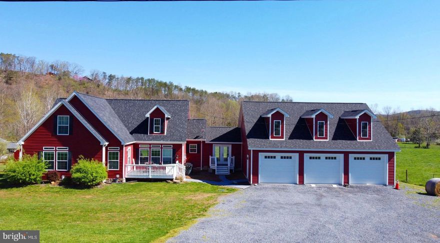 Country Living with a touch of Elegance!  This  Beautiful home has it all and more.  Bordering the North River and surrounding mountain views could also make this a weekend/vacation getaway or anyones dream home.  The like new home has 4 bedrooms which consist of 2 En suites.  One on each level.  Additional 2 bedrooms are also on the main level with an additional full bath.  Upper level has a bonus room in addition to the Primary bedroom.  This could be a private sitting room, office or maybe even a nursery.  The large 40'X40' 3 car garage has so much to offer.  There is water and a drain and also roughed in for bath.  Above is additional 20'X40' space that could be converted into additional living space. There have been many  improvements in the past few years, have your agent send you those from under docs.