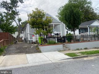 Two Level Cape Cod with Basement, Main Level Offers 2 Bedroom and 1 Bath, Kitchen, Dining Room, Living Room, Basement Fully Finished with 2 Bedrooms and 1 Full Bath, Large Driveway, Home Being Sold AS IS. Needs some TLC, Seller is always home, Close to Public Transportation, Just Go and Show, No Lockbox, PRICED BELOW MARKET FOR A QUICK SALE