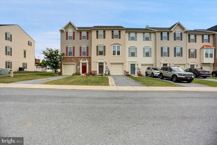 Welcome to 59 Gauley River Path!  There's so much to say about this home.   While most of the time the excitement comes from inside the home, this one is just as great outside, but we'll get to that.  What you're going to notice is a big home in great condition.  With almost 2000 square feet of living space, you'll find 3 very nice sized bedrooms and even the possibility of a 4th on the lower level.  The second floor is where you'll spend most of your time as this is where the kitchen and living room is located.  On the rear of the house there is an updated deck where you can sit and relax or grill your favorite foods.  The third level is where the main bedrooms are located.  Another MAJOR BENEFIT is, this is where the laundry is located!!  No carrying heavy laundry baskets up several flights of stairs.  Show those knees some love!  Light colors and open floor plan gives this home a spacious yet super cozy feel!  Now on to the outside.  Very clean, well kept neighborhood is what you'll notice upon entering.  The best part about this community is it has a PRIVATE GATED PARK!  Yes, 12acres of fun!!!  Wether it be basketball, soccer, playground equipment, or just relaxing in the sun, this part of the neighborhood is one of a kind!  Another major perk to this park is you will have private access to the Potomac river including a boat launch!!!!!!  So, with all these perks and benefits, this is definitely a MUST SEE and priced to sell!  Make your appointments today!!!!