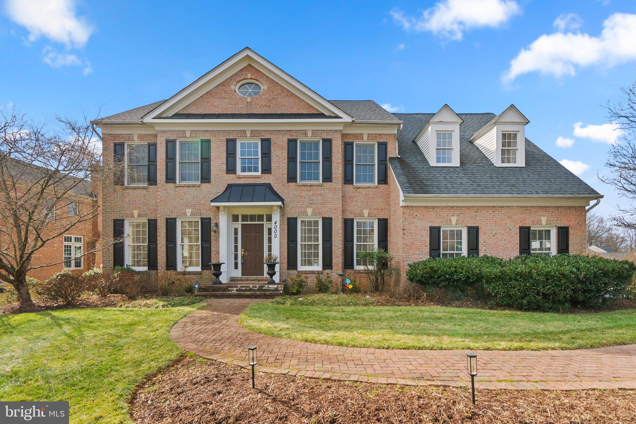 The search stops here! This one is an absolute showstopper, and cannot be missed. Freshly painted throughout, and with natural light around every corner, this incredible brick colonial features 6 bedrooms, 4/2 bathrooms, and over 6,300 square feet; this home has it all! Gleaming hardwood floors await on the main level and the incredible stone fireplace in the family rooms leads into the kitchen. The kitchen is an entertainer's dream, with ample storage and prep space and a wonderful kitchen island, perfect for bar top seating or additional prep space. The amazing sunroom is a can't-miss feature of this home. Upstairs features 5 bedrooms and 3 full bathrooms, including the breathtaking primary suite with wonderful skylights, a huge walk-in closet, and a relaxing and spacious ensuite with a soaking tub, dual vanity, and shower. Up one more level is the absolutely amazing movie theater room (*where all furniture and electronics are conveyed to the new owner*). Downstairs spares no expense, with another fireplace, a kitchenette for entertaining, a full bedroom and bathroom, walkout access to the backyard, and more! With just minutes to everything Olney has to offer and seconds away from major commuter roads, this one is too good to miss! Call us today!
