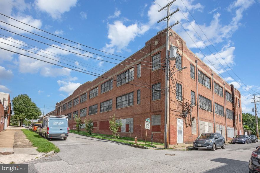 60,000sf Industrial Building for Sale in Hampden.  End user or Redevelopment play.  I-MU1 Zoning.  This property sits on .66 Acres tucked away in a quiet neighborhood of recently developed high end townhouses, condos, rowhomes, and apartments including the Fox Building directly to the rear of the site.  The top level and main level are each 24,000sf.  The basement level is 12,000sf and is currently leased on a short-term basis to a longtime tenant for storage purposes.  The building has a full brick exterior with I-beam construction and heavy 480 volt, 3 phase power.  It is  fully sprinklered with 12ft ceilings on each level and a freight elevator servicing all 3 floors.  There are 2 loading docks.  There are ceiling mounted gas blower units on all levels.  The building was officially confirmed by the City as Historic on July 2, 2024. It is a CHAP Landmark, not a National Historic Landmark.  Eligible for Chap Tax Credit if redeveloped.  The property is positioned just off of I-83 with quick access to Rt 40, I-695, and close proximity to Downtown Baltimore.  It is just a few blocks from ‘the Avenue’ on 36th Street.  Walking distance to some of Baltimore’s best restaurants and local shopping.