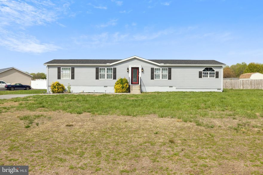 Welcome to your dream home in the desirable Pine Ridge Subdivision! This newly renovated 3-bedroom, 2-bathroom manufactured home sits on a spacious half-acre corner lot.  Step inside to discover new hardwood flooring that flows seamlessly through the entryway, dining area, living room, and bedrooms. The kitchen is a showstopper, featuring new marble flooring, a stunning waterfall marble island, matching backsplash, and stainless steel appliances.  The living room and bedrooms have ceiling fans, recessed lighting throughout and a separate laundry room with ample storage.  A generous family room provides ample space for entertaining or relaxing by the cozy fireplace. Both bathrooms have been thoughtfully upgraded with backlit, motion-sensor mirrors, electronic toilets/bidet with remotes, with multiple features, and deep soaking bathtubs for a touch of luxury.  The entire home has been freshly painted, making it move-in ready and full of charm.  New roof, new water pump with transferable warranty, septic system serviced and class H inspected. This is a must-see property. Owner is a licensed real estate agent in Delaware and Pennsylvania and has a financial interest in the property.