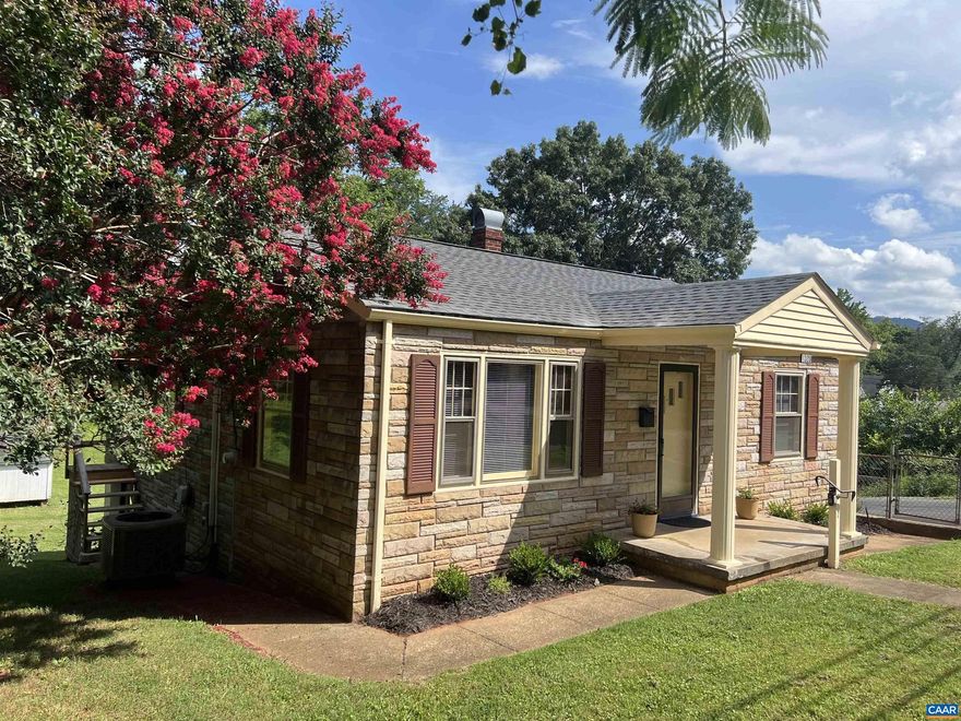 Must see lovely Belmont home on large lot (possible room for 2nd unit if new City Zoning Code gets re-approved!).   You must see the lovely wood floors, large living room & eat-in kitchen plus full walk out basement (rough in for bath ready to convert into an in-law suite or other use).   Many upgrades including 200amp service, renovated bathroom, updated plumbing & more.   Why rent?  Make this house your home w/ low monthly payments less than rent.  On City Bus Line, near UVA, hospitals, downtown mall, shopping, dining, and park. Priced to sell!,Formica Counter,Wood Cabinets