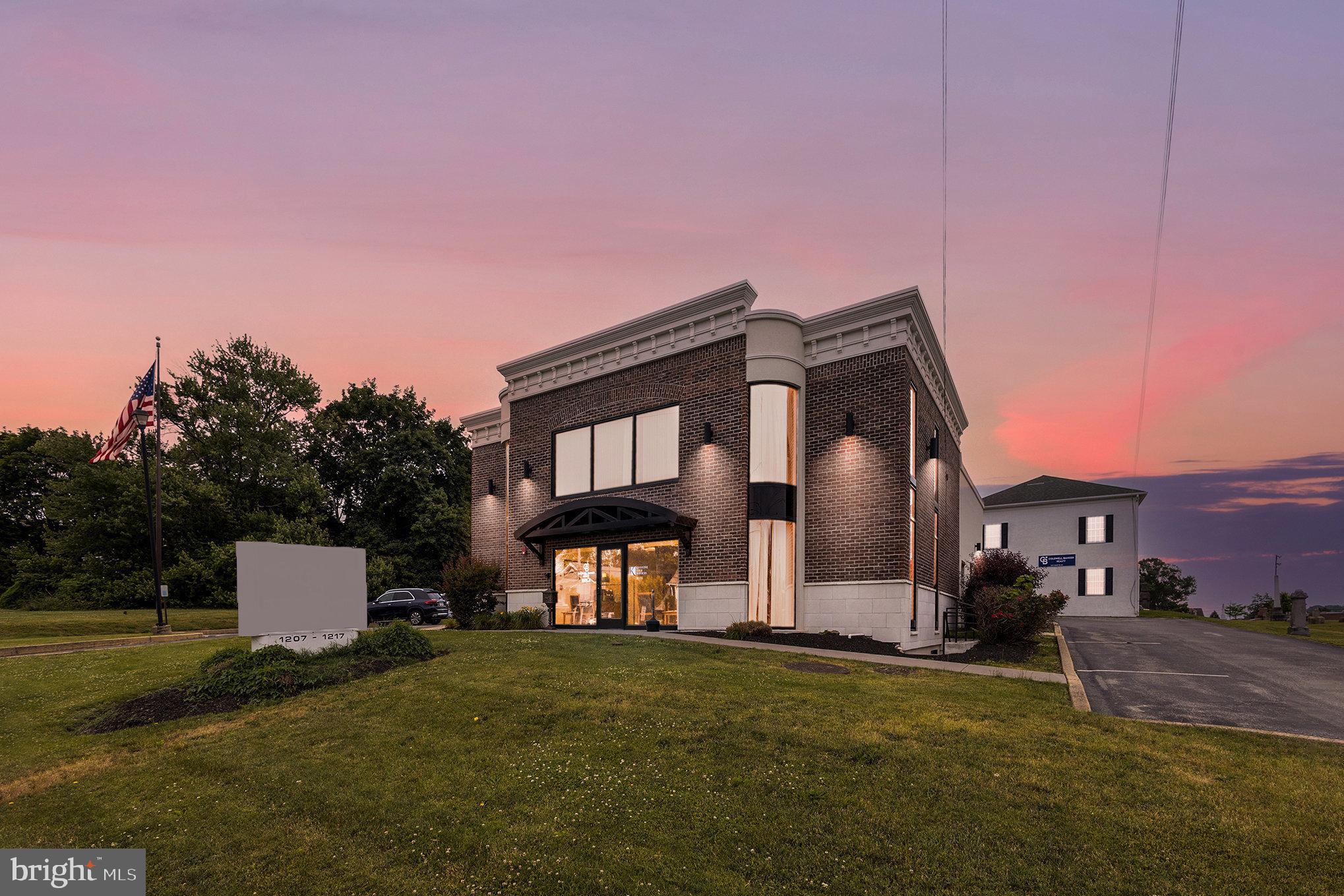 Available for purchase 1207 -1217 Fayette Street AKA 1207-1217 Butler Pike. With its exceptional visibility and attractive facade, 1207 Fayette Street offers unique advantages not found in traditional office park spaces. The front brick exterior was meticulously restored approximately five years ago, enhancing the curb appeal of this 2-story, 5,200 sq ft office space, which includes three bathrooms.
Adjacent to this, 1217 Fayette Street features a rear building boasting approximately 3,700 sq ft, with two ADA-compliant bathrooms and a kitchen. Zoned as Whitemarsh Township B, the property allows for various land uses such as Retail, Office, Apartments, and multiuse. Additionally, the site provides ample parking space for up to 50 cars.
Conveniently situated off the I-476 and I-76 Interchange, RT 23, the property sees a high traffic volume of 15,741 vehicles passing by daily on its 1.65-acre site. The location enjoys visibility with 14,000 vehicles daily on W 9th St & Butler Pike and 7,354 vehicles on 8th St & Fayette Streets. This substantial daily vehicle count makes the site an ideal exposure point for potential customers and a promising location for any new proposed use.