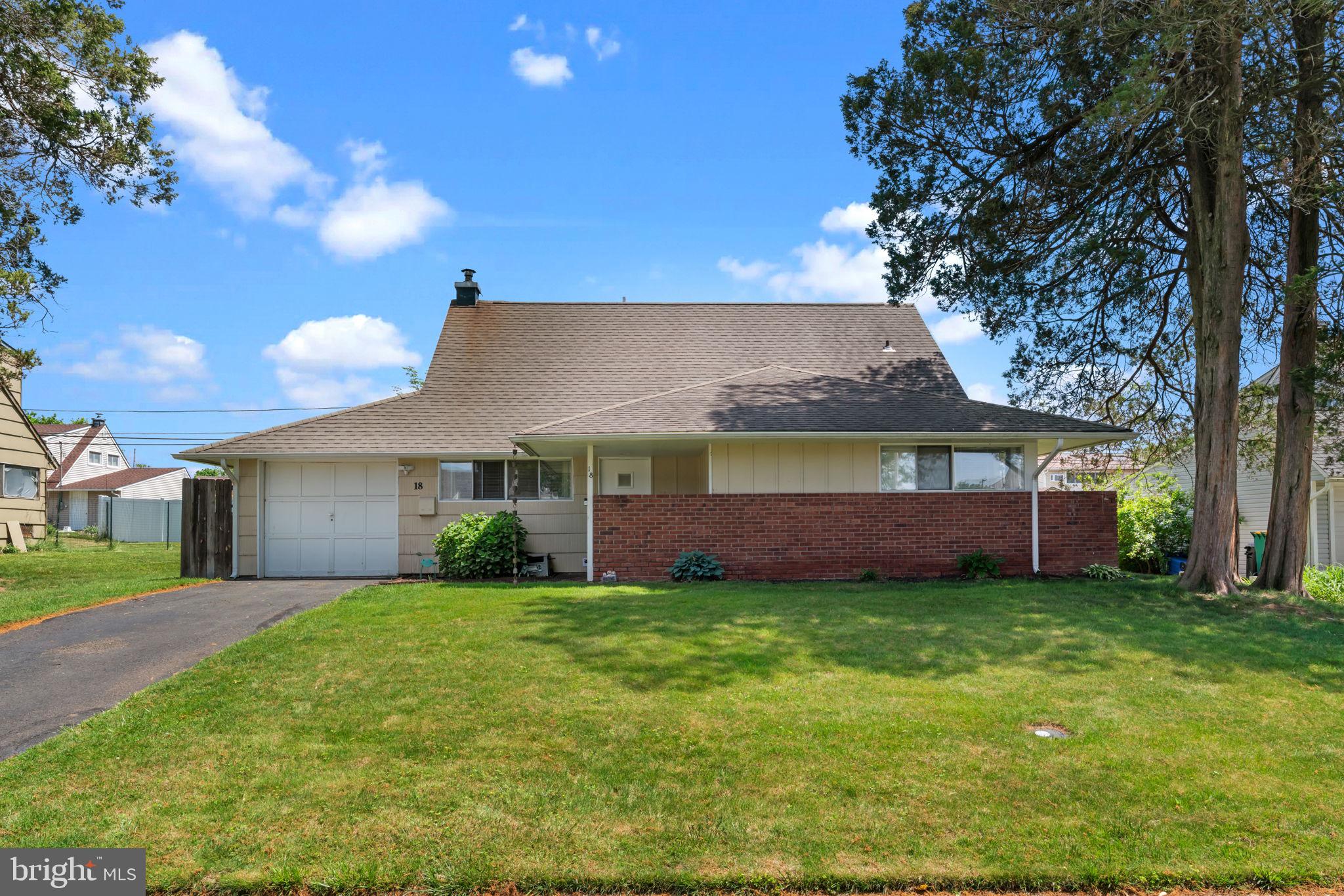 Welcome home! This large 4 bedrooms 2 full bath Pennsylvanian (Colonial) located in Highland Park features a 1 car garage and is located with-in the Neshaminy School District! Additional features include: Freshly painted and new laminate flooring throughout the entire home, a covered front porch, living and dining rooms. The kitchen features newer cabinets, a stainless steel sink, new refrigerator, range and dishwasher and a countertop bar. The formal dining room leads outside to a large paver patio. There is a hall coat closet & a large hall linen closet both on the first floor! The master bedroom is located on the first floor & features a full walk in closet. The 3 additional bedrooms are all very large. There is also a large storage area located off of the second floor hallway! This home is a Pennsylvanian model & located on pretty street in the Highland Park section with close access to all major highways! Available immediately. The owner will require a minimum credit score of at least 670 , two months security deposit, first months rent and a 2 year lease minimum. The owner is a Pa. licensed Realtor.