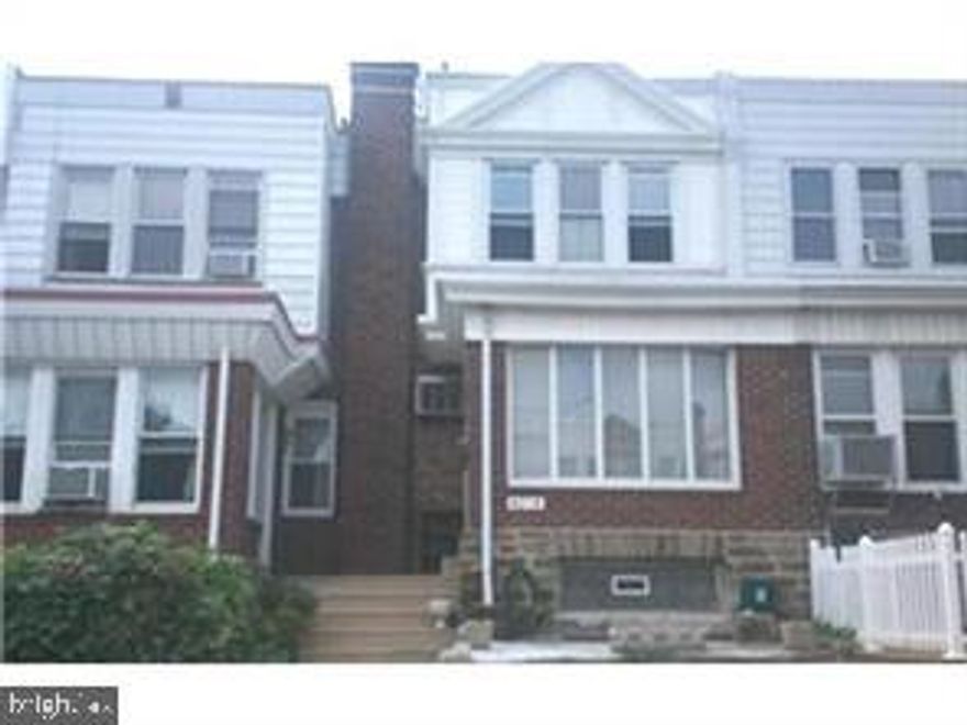 Investor Special - just about "rent ready", needs some minor TLC. 3 bdrm 1 bath straight-thru, row, enclosed front porch, laminated wood floors, ceiling fans, wall air cond, large kitchen, bath w/jacuzzi tub, replacement windows thru out, vinyl siding and 2 steel doors, garage was removed.  Easy to show.