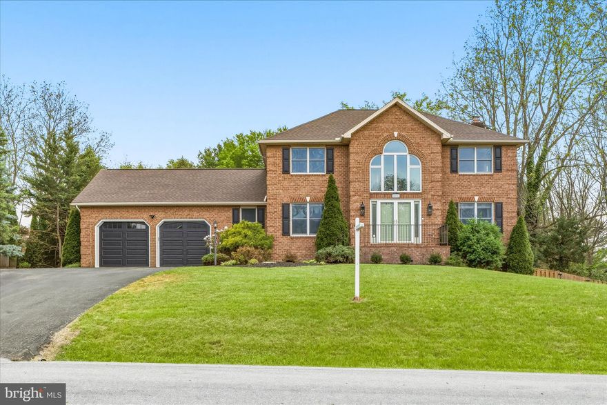 Check out this updated brick colonial that blends classic charm with modern style.  Located in the sought after Brightwood Acres neighborhood that feeds to Boonsboro High School, this home provides privacy and enjoyment on the interior and exterior.   As you enter you are greeted by the two-story foyer that screams luxury.  A large kitchen with new granite countertops offers plenty of space for storage, entertaining, and preparation.  The kitchen leads into a large living room to provide an open floor plan and a custom stone fireplace.  This level also offers the benefits of the colonial layout with the formal dining, a bonus living area, and a large office/craft room.  The upper level provides three large bedrooms led by the primary suite.  The suite included trey ceilings and a spacious on-suite with two large vanities, a soaking tub, and a shower.   The exterior provides a serene and private feeling with so much to enjoy.  This fenced back yard includes mature trees, a patio, a koi pond, and an additional bar space.  No HOA, fantastic layout, and a top rated school district. This one has it all