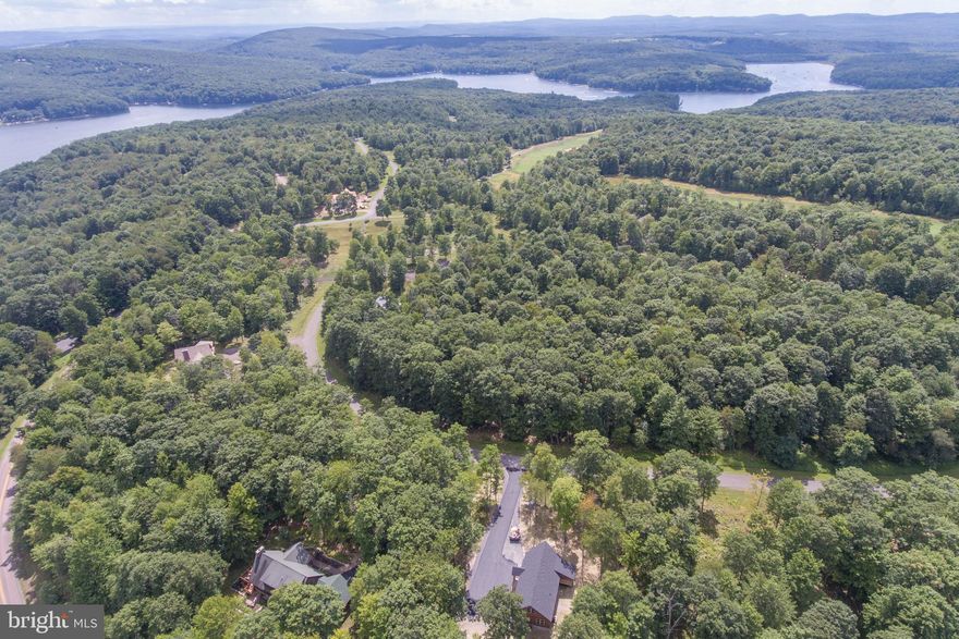 Take a look at Lot #47 in Sandy Shores Heights! This 4 season mountaintop location is just minutes to everything fun in the Deep Creek Lake area-Wisp Ski Resort, Lodestone Golf, Fork Run Recreation area and so many incredible state parks for outdoor enjoyment! Underground utilities to site to include the availability of public water & sewer hookups, electricity, fiber optic lines/cable, underground propane and a community compactor. Level wooded lot to build your dream home and enjoy the peacefulness of nature surrounding you! 
DISCLOSURE: RAILEY REALTY IS NOT THE CARETAKER OF PROPERTIES LISTED BY IT.  DURING INCLEMENT WEATHER CONDITIONS, PROSPECTIVE PURCHASERS AND THEIR AGENTS ASSUME ALL LIABILITY ASSOCIATED WITH OR BY WEATHER AT THE PROPERTY.