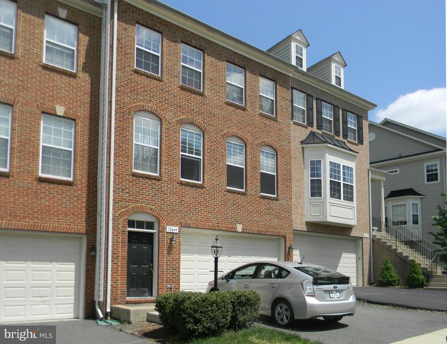 Spacious 3BR/3.5BA/2Gar TH w/ 3-lvl bump-outs available NOW. Backs to common area & trees. Fenced yard. Main lvl 9' ceilings. Deck off gourmet kitchen w/ 42" cabinets & island. LL Rec w/ gas FP. LUX Master Suite w/ sitting area & walk-in closet,. MBA with dual vanity, sep shower & soaking  tub, Close to Fairfax Cnty Pkwy, Rt 29,  I-66, Shopping  & Restaurants.