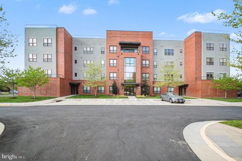 Photo of 8970 Fascination Court #214, LORTON, VA 22079 (MLS # VAFX2302996)