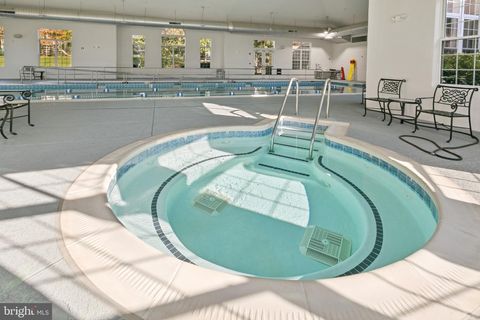 Tiny photo for 8970 Fascination Court #214, LORTON, VA 22079 (MLS # VAFX2302996)