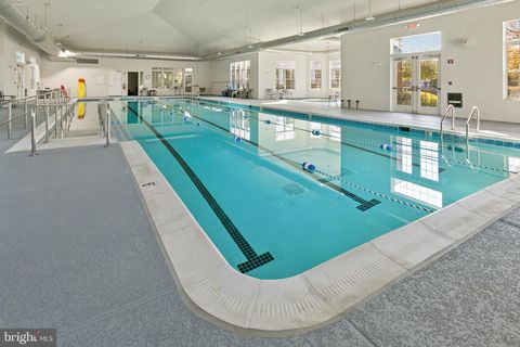 Tiny photo for 8970 Fascination Court #214, LORTON, VA 22079 (MLS # VAFX2302996)