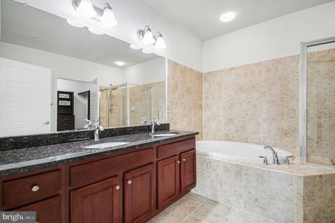 Tiny photo for 8970 Fascination Court #214, LORTON, VA 22079 (MLS # VAFX2302996)