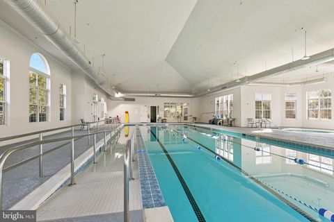 Tiny photo for 8970 Fascination Court #214, LORTON, VA 22079 (MLS # VAFX2302996)