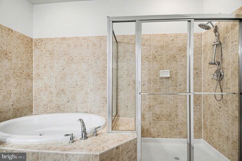 Tiny photo for 8970 Fascination Court #214, LORTON, VA 22079 (MLS # VAFX2302996)