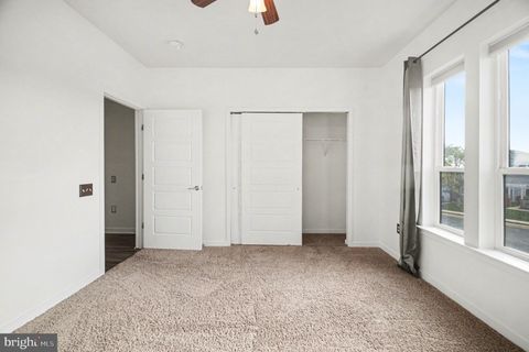 Tiny photo for 8970 Fascination Court #214, LORTON, VA 22079 (MLS # VAFX2302996)