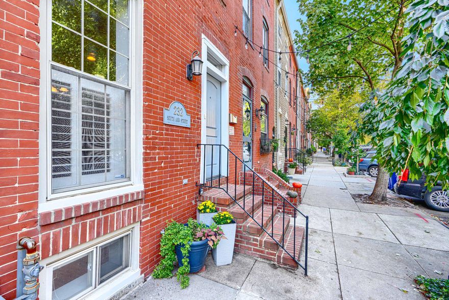 Beautiful 4-level townhouse in Historic Upper Fells Point (built in 1900) seamlessly blends historic charm with modern upgrades across more than 3,000 square feet of living space. Step inside to a spacious, open floor plan featuring warm hardwood floors, abundant natural light, and elegant crown molding throughout.

With multiple outdoor spaces, spa-like baths, and over 3,000 square feet across four levels, this home offers a rare combination of space, comfort, and city living.

The heart of the home is a beautifully updated kitchen with granite countertops, stainless steel appliances, and ample table space—perfect for everyday living and entertaining. The home offers three bedrooms and three and a half baths, including two spa-like suites: one with a jacuzzi soaking tub and oversized walk-in shower, and an upper-level suite featuring a spacious two-person shower. Both suites include generous closet space.

The fully finished basement provides versatile additional living space—ideal for a media room, home gym, office, or guest room. Two decorative brick fireplaces add character and charm.

Outdoor living is a standout feature, with three levels of decks—including a large rooftop deck with sweeping city views—as well as a private rear patio, perfect for relaxing or hosting guests.

Additional features include a central vacuum system, front-loading washer and dryer (2021), tankless water heater (2023), and dual HVAC systems (2022) for year-round comfort and efficiency.

Located just steps from Patterson Park, the Fells Point waterfront, and the vibrant restaurants, shops, and entertainment of Canton and Harbor East, this home also sits on a uniquely welcoming block known for its strong sense of community. Neighbors know one another, creating a friendly, connected atmosphere that’s rare to find in city living, with a shared community garden and neighborhood events that bring residents together throughout the year.

This home offers the perfect combination of historic character, modern comfort, and walkable city living.