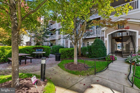 Photo of 507 Sunset View Terrace SE #104, LEESBURG, VA 20175 (MLS # VALO2138222)