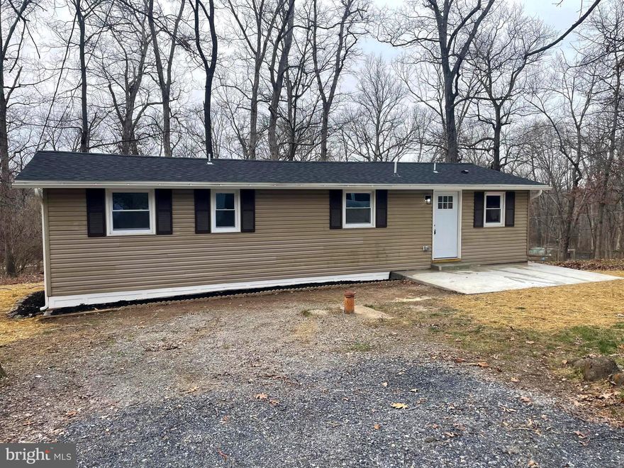 Welcome to 148 Little Shady Lane!! This adorable 3 bedroom 2 bathroom ranch style home is almost completely BRAND NEW! As you walk through the front door, you enter into a small entry space before rounding the corner to the open concept living, kitchen, and dining space. The kitchen features all new stainless steel appliances, cabinets, and granite countertops. Off to left of the home as you walk in, there are two bedrooms and a full bathroom. On the opposite side of the home, you will find the primary bedroom with its own full bathroom. Both bathrooms have been completely redone! New flooring and paint run throughout the home, and the roof is completely new! Outside you will find that you are surrounded by nature and a quiet setting offering you peace and tranquility in your home. Don't let this one slip by you... Schedule your showing today!!