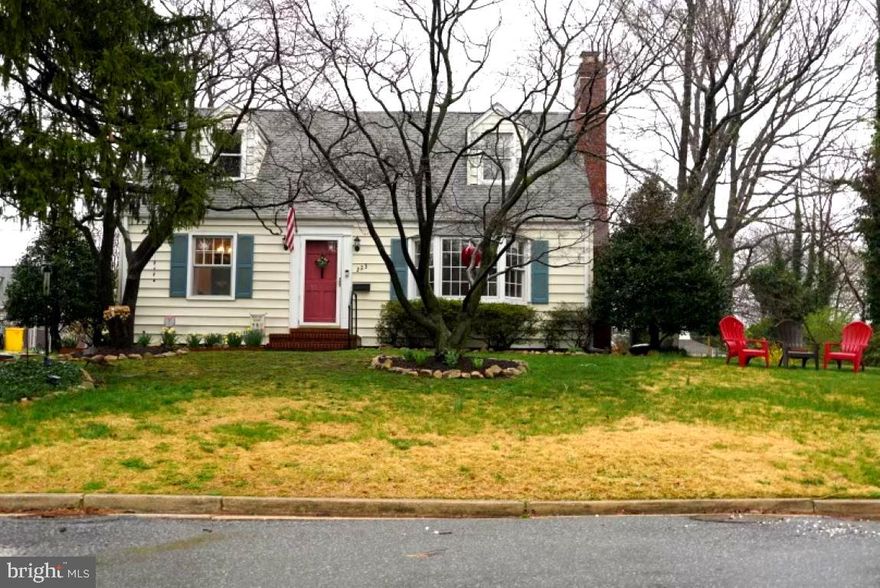 Come make this cozy Cape Cod your new home! Where you are met with refinished hardwood flooring the moment you step foot inside. In the living room, bathe in the natural light from the bay window and warm up near the wood-burning fireplace. Let a winning combo of natural light and hardwood flooring guide you through the dining room and kitchen. Follow the steps down to a fully finished basement with an office, 11’x21’ storage room, laundry room, bar and space for lounging or entertaining. When it’s time to retire, make the main bedroom on the first floor your choice for spacious relaxation, as it also includes double panel sliding doors to the backyard. Find plenty of room on this quarter of an acre lot, and plenty of parking on this extended driveway! A perfect location in Linthicum Heights, just a 10 min drive from BWI airport and a short ride from the Inner Harbor. Find it right off 695 and within walking distance to the light rail, to Linthicum Park, Linthicum Elementary, and Shipley Shopping Center.
