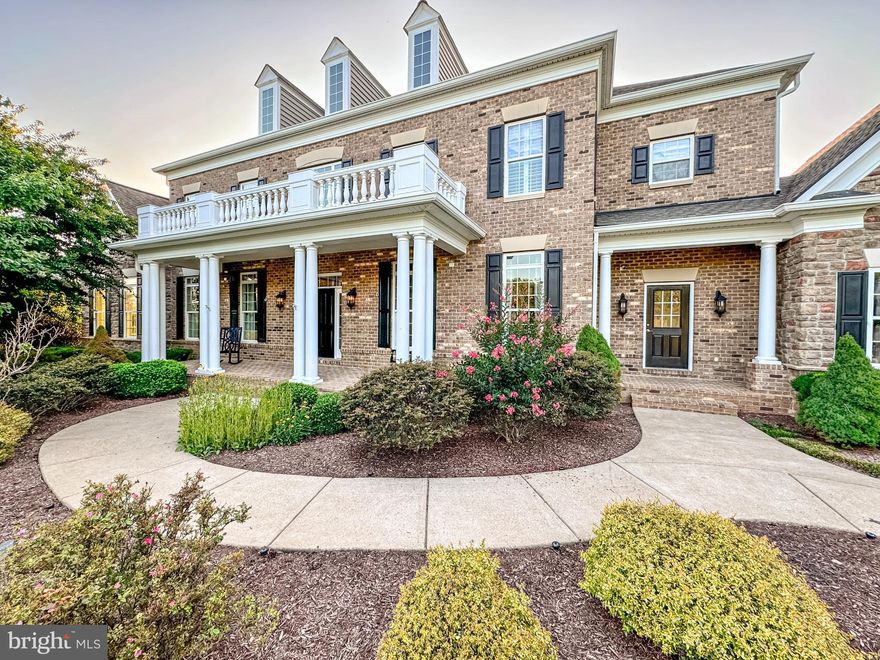 Discover the grandeur of 22 Lupine Drive, a stunning property nestled on 3.97 acres in the prestigious Glens Subdivision of Stafford, VA. This home, featuring 5 bedrooms and 6.5 baths, offers unparalleled luxury and functionality. The property boasts stone entry columns with lights and electric outlets, and a 3-car garage equipped with a double and single door, side entry, door opener, garage cabinet set, refrigerator, and custom concrete steps leading to the mudroom. The exterior is adorned with custom stonework and a flagstone stone wall, complemented by an 11-zone underground sprinkler system and a zipline for added fun. Enjoy breathtaking sunsets from this exquisite property, creating a serene and picturesque living experience.
Inside, the main level impresses with 10’ ceilings, a grand foyer with hardwood flooring, and elegant living and dining rooms featuring crown molding, hardwood floors, and wainscoting. The family room, with its gas fireplace and stone surround, coffered ceiling, and recessed lighting, provides a cozy retreat. The kitchen is a chef’s dream with hardwood flooring, a gas 5-burner cooktop, double oven, microwave, granite countertops, island, and custom walk-in pantry with Mongolia slate floors. The adjacent breakfast area and morning room with tile flooring and a ceiling fan add to the home’s charm. Custom millwork, pocket doors, and handmade shutters from Shenandoah Shutters in Richmond, VA, enhance the home’s aesthetic.
The upper level, with 9’ ceilings, features a luxurious primary suite with double door entry, sitting area, walk-in closet, and a spa-like bathroom with tile flooring, a custom tiled shower, soaking tub, and his and her sinks with a vanity. Three additional bedrooms, each with a private bath, and an upper-level laundry room complete this floor. The lower level offers a recreation room with stone columns, a wet bar with porcelain tile, beverage refrigerator, dishwasher, sink, granite countertops, and custom built-ins, a game room, media room, equipment room, kids play/craft area with porcelain tile, and an additional bedroom and two bathrooms. This home is equipped with double insulated basement ceilings for noise reduction and energy efficiency, dual tankless hot water heaters capable of 22 gpm, upgraded insulation, and is pre-wired for systems such as Control4, Creston, or Savant. With a majority of the lights being LED, this home combines elegance with modern energy efficiency, making it a perfect sanctuary in the heart of Stafford.