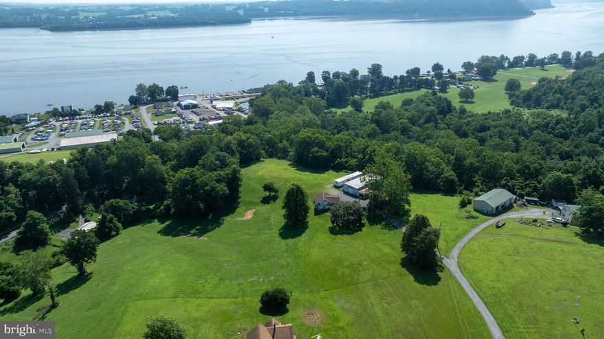Spectacular 8.5-Acre River View Property with  Massive Pole Barn – Overlooking the Susquehanna River!

Discover the perfect blend of privacy, space, and breathtaking views with this rare 8.5-acre parcel of land perched above the beautiful Susquehanna River. Whether you're looking to build your dream home, create a private getaway, or develop a recreational retreat, this one-of-a-kind property offers endless potential.
The land features a massive70x40 pole barn with a 400amp electrical service for the property and water ideal for storing equipment, vehicles, or converting into a workshop, studio, or hobby space. With gently rolling terrain, mature trees, and stunning panoramic views of the river, this parcel invites peace, inspiration, and opportunity.
Located in a quiet, rural setting but with convenient access to nearby towns and highways, this property is a unique find for anyone seeking space, beauty, and utility in one exceptional package.

Also included is a mobile home—ideal as a primary residence, guest space, or temporary living while you build a dream home. Additionally, there’s an unfinished structure that began as a garage but was being converted into a home—a great opportunity for expansion or a custom project.

Don’t miss this chance to own a slice of paradise with river views and room to grow. Schedule your visit today!

No sign on property-Please do not drive back driveway without an appointment as this is a private driveway.