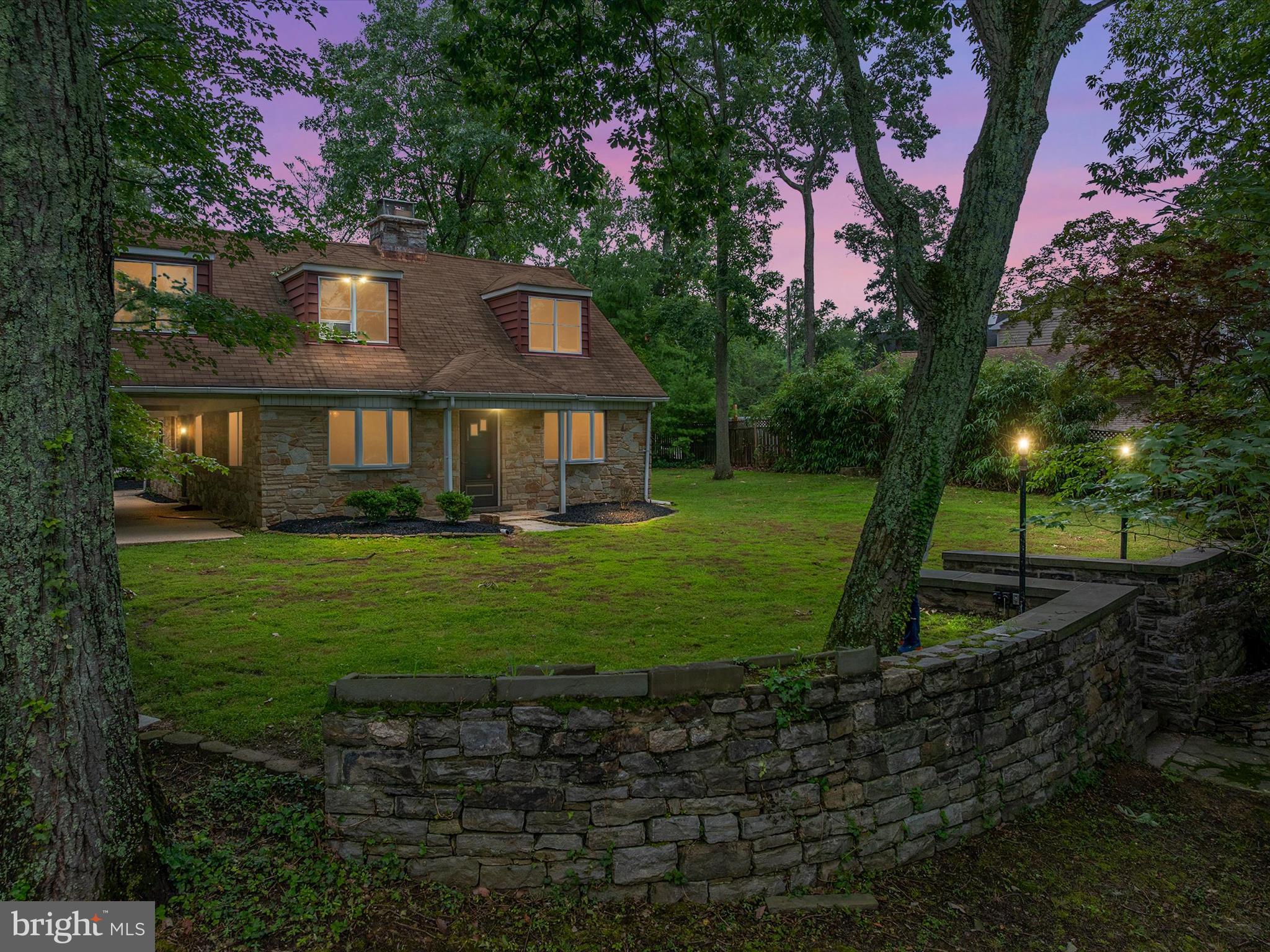 168ft of premier shoreline on the Magothy! Deep water, 10+ ft at the end of the pier, this beautiful wooded ¾ acre home offers serenity, privacy and ample opportunity. Stone steps and walkway down to the water with a full stone wall running the length of the property. Sandy bottom, new pier decking in 2019 and a waterfront shed for storage.
The home itself sits high above, on a level lot, providing both views and serenity. The house was constructed by a former mason and it’s literally solid as a rock. Three bedrooms, 2 bathrooms and a stately stone fireplace provide a cozy atmosphere. Main level bedroom and full bathroom, separate dining area and galley kitchen. Simple, nothing flashy but well cared for- pride of ownership shows. Large deck on the main level, balcony off the primary with water views, outdoor patio/ seating area and flat yard. Plenty of room for parking! Roof 2011, Trane HVAC 2006 with backup oil heat and fresh paint. Laurel Acres community is small and friendly with a playground, boat ramp and basketball court. Mere minutes to dining, amenities and all major commuter routes.
Love it as it is or imagine a blank canvas and write your own story. Home is available for the first time in over 25 years and for good reason… it’s a gorgeous place to call home!