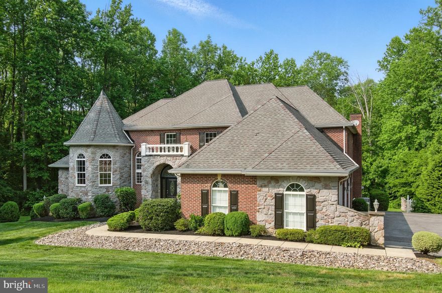 Welcome to 1002 Covington Way, a stately home nestled on a private street and surrounded by trees, but just minutes from downtown Annapolis. This gorgeous French-style home offers gracious living inside and out! From the stunning entranceway to the light filled great room, classic elegance is the hallmark of this expansive property sited on a 2+ acre lot. With almost 7,000 square feet of living space in addition to a finished basement, everyone will find their perfect space in this five bedroom property . A light and open foyer leads to defined dining and entertaing areas. The warm and welcoming kitchen includes bar seating, granite counters, and stainless steel appliances, and connects to the two-story great room with stone fireplace. An expansive deck off the main level provides a beautiful flow for entertaining and the perfect spot to relax and enjoy your private view of the woods. A main floor primary suite includes the walk-in closet space of your dreams and an elegant primary bath. Upstairs, three additional bedrooms include one suite with private bathroom and two bedrooms with a shared bath. The finished basement includes a large bedroom, full bath, and living space that would make a perfect au-pair or in-law suite. Entertain in style with a built-in bar, pool table room, and entertaining space with fireplace. The lower level walks out to an in-ground pool! Sold in its as-is condition, this home is priced to let you make your dreams of an elegant Annapolis estate become a reality! 1002 Covington Way is an easy commute to Annapolis and near Routes 50 and 97 for an easy commute to Washington, DC or Baltimore. Enjoy dining, shopping and boating in Annapolis, with additional access to marinas on the Severn River or South River. Welcome home!
