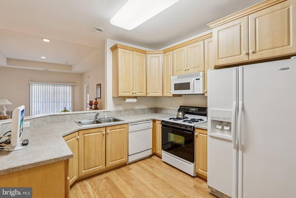 Photo of 4 Falcon Drive #UNIT 302, HOLLAND, PA 18966 (MLS # PABU2112464)