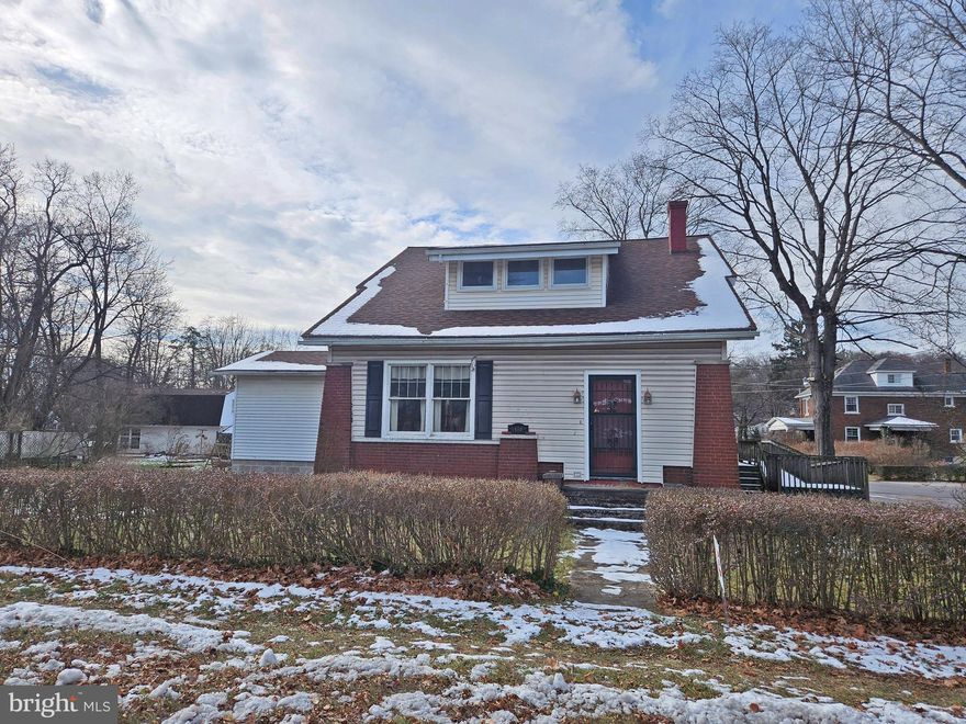 This charming home highlights beautiful original woodwork and timeless architectural character throughout. It offers generous living spaces, including a large family room addition ideal for gatherings, as well as a convenient first-floor bath for added functionality. The second-floor enclosed porch provides a versatile retreat, while abundant closets and storage areas enhance everyday convenience. Situated on a huge yard with plenty of outdoor potential, the property also includes an oversized garage with substantial additional storage.